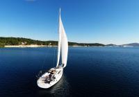 sailing yacht sails in sea bay croatia on blue sky sailboat sail